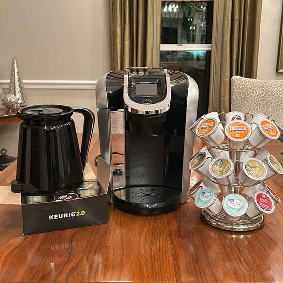 Keurig 2.0 with coffee pot, pod carousel, and a selection of coffees. - Picture 1 of 7